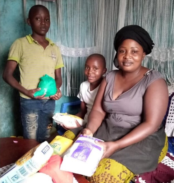 Family with donated groceries